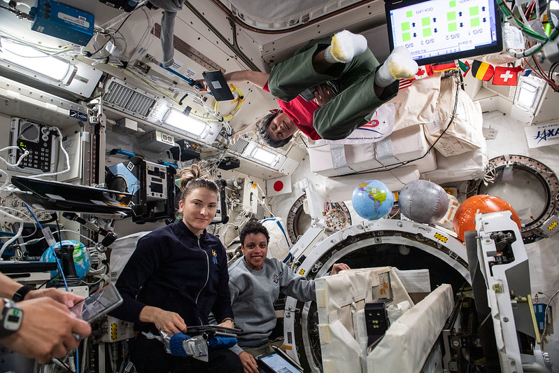 image of astronauts working in module