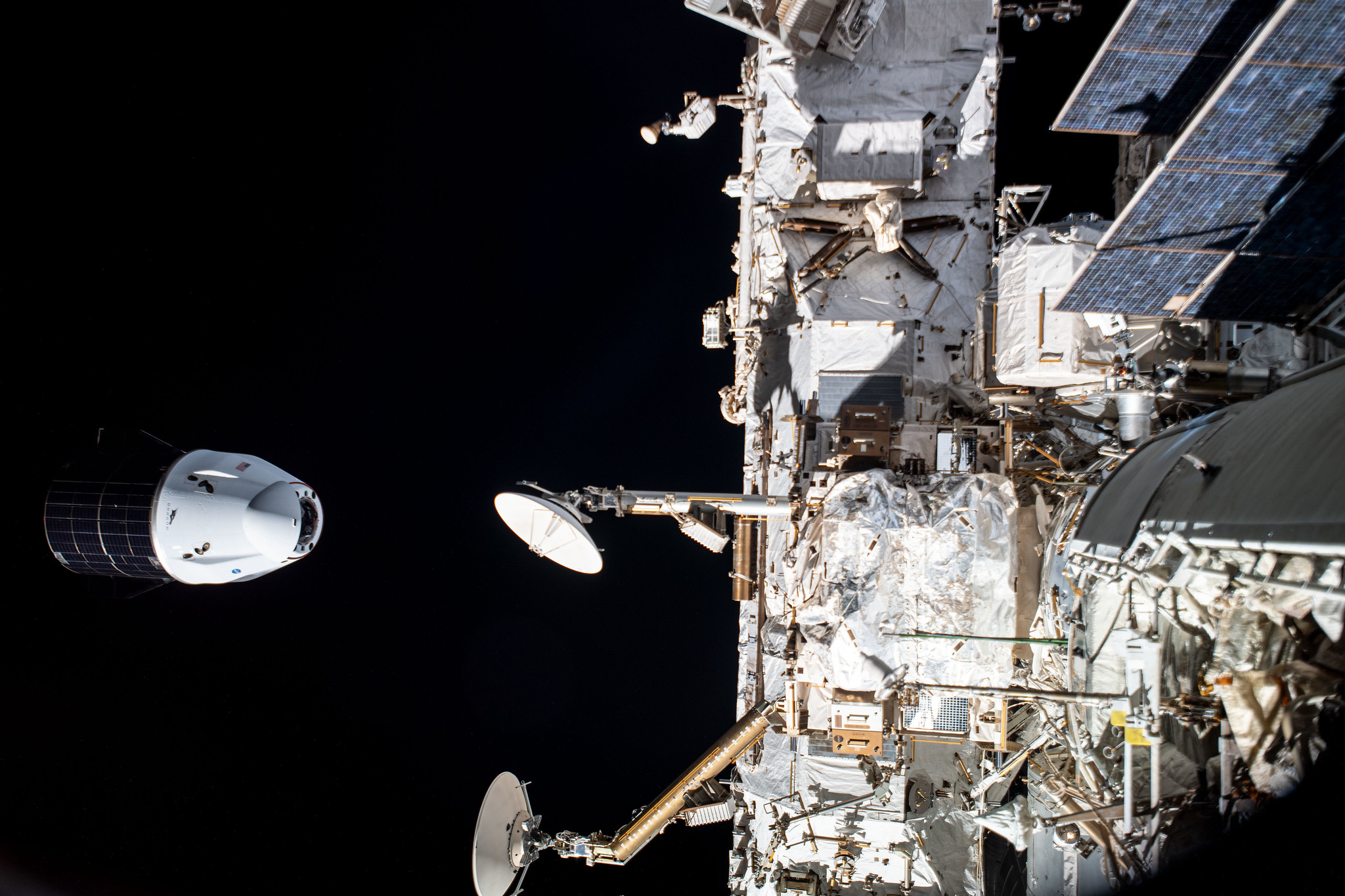 The SpaceX Cargo Dragon resupply ship is photographed departing the International Space Station after it undocked from the Harmony module's space-facing international docking adapter on July 8, 2021.
