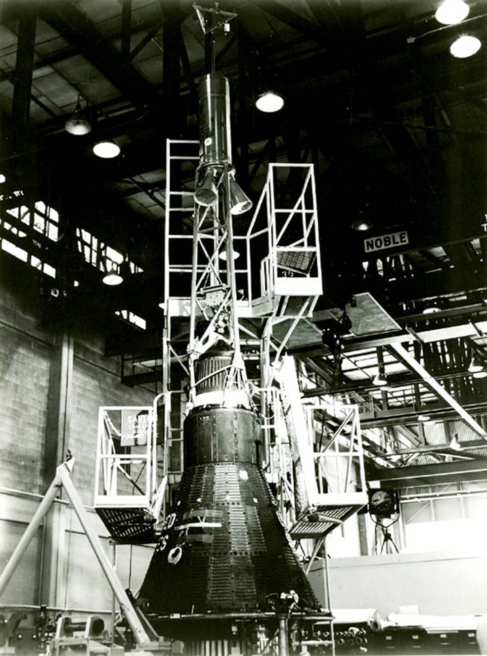 aurora_7_in_hangar_s_preflight_processing