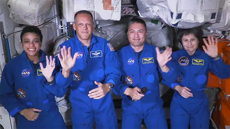 Astronauts (from left) Jessica Watkins, Bob Hines, Kjell Lindgren, anmd Samantha Cristoforetti wave following Starliner farewell remarks from NASA leadership. Credit: NASA TV