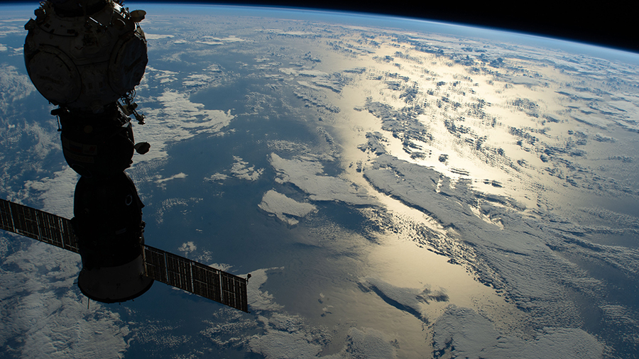 A portion of the station is silhouetted as it orbited 268 miles above the Pacific Ocean off the coast of Chile.