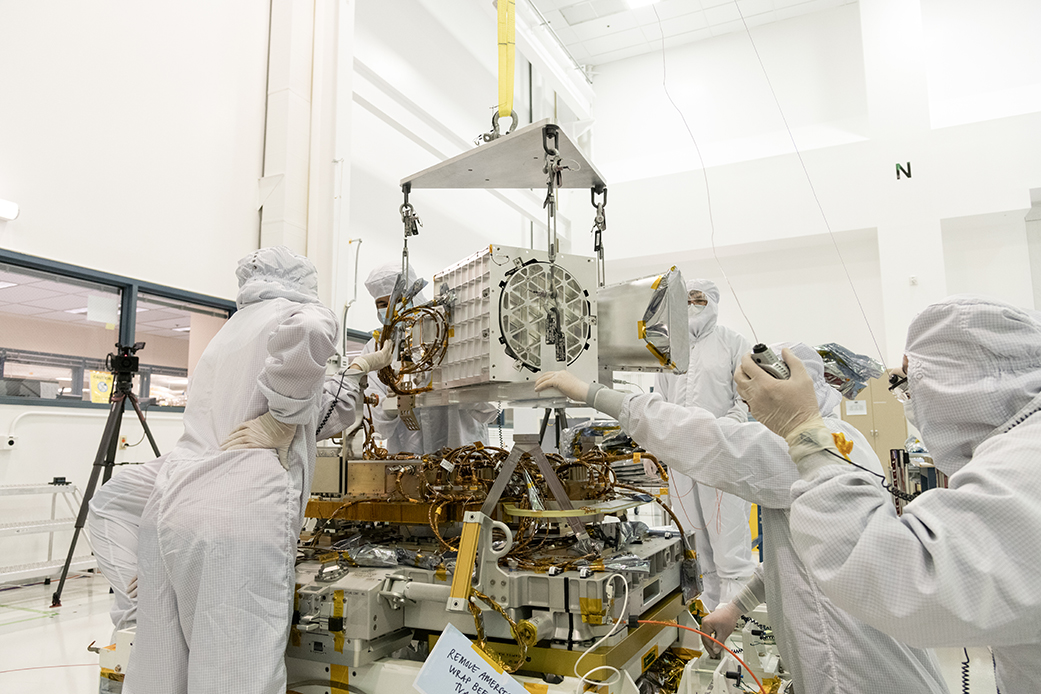 JPL engineers and technicians put together components of EMIT