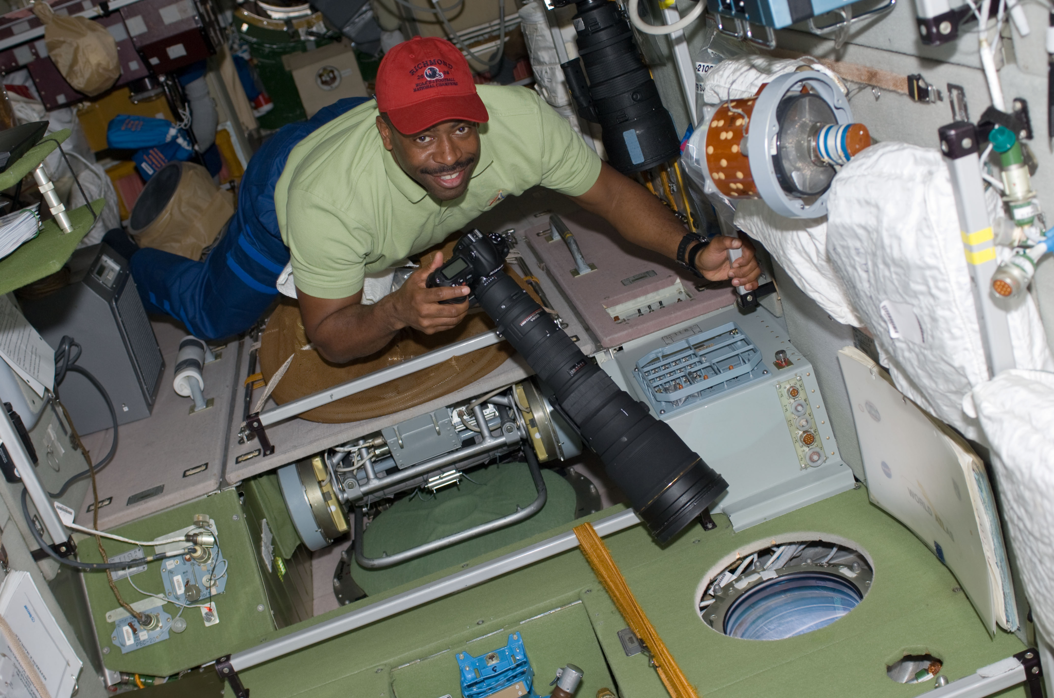 image of astronaut taking pictures of Earth