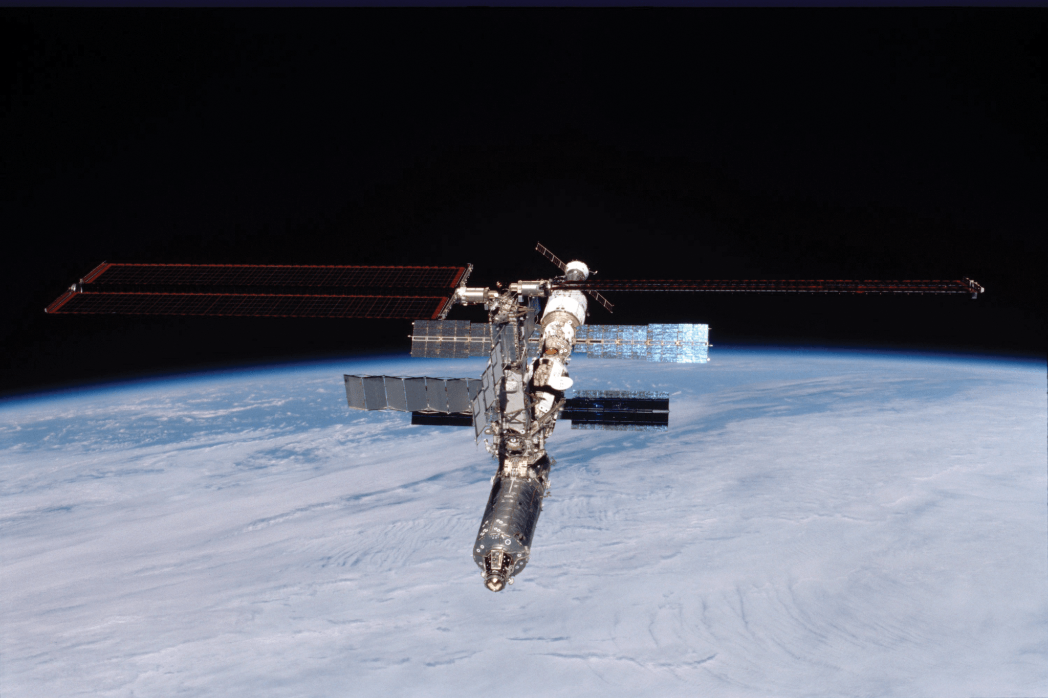 image of the space station with Earth in backdrop