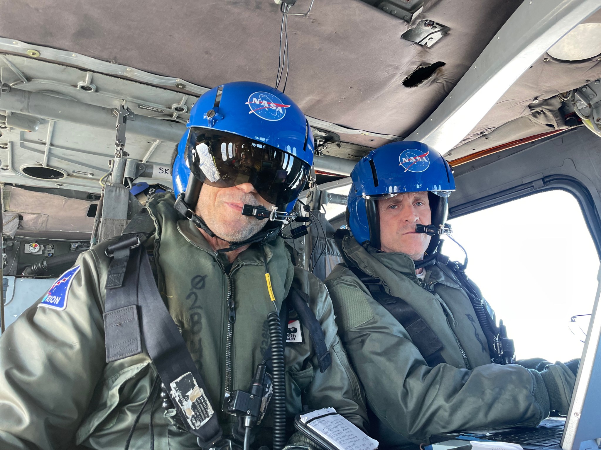 Don Reed and Jeff Fox in the helicopter cabin