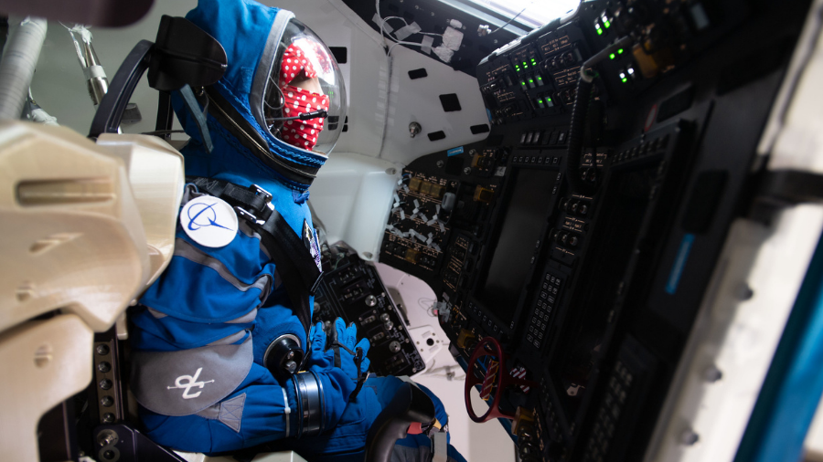 Rosie the Rocketeer, Boeing's anthropometric test device, is pictured in the commander's seat of the company's CST-100 Starliner crew ship for the Orbital Flight Test-2 mission at the International Space Station.