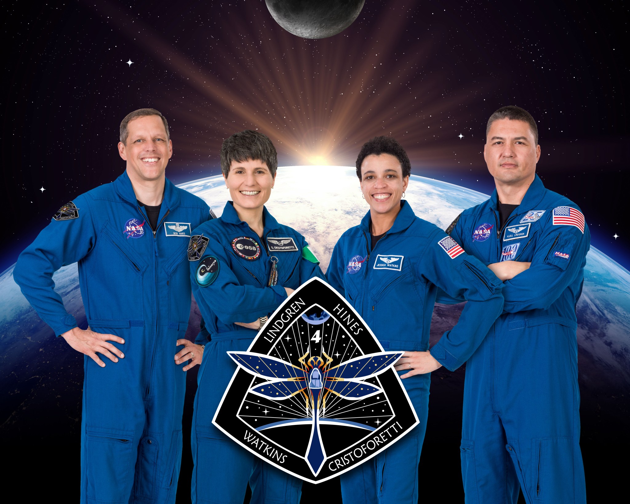 The official crew portrait of the SpaceX Crew-4 astronauts representing NASA's Commercial Crew Program. From left are, Pilot Robert Hines, Mission Specialists Samantha Cristoforetti and Jessica Watkins, and Commander Kjell Lindgren. 