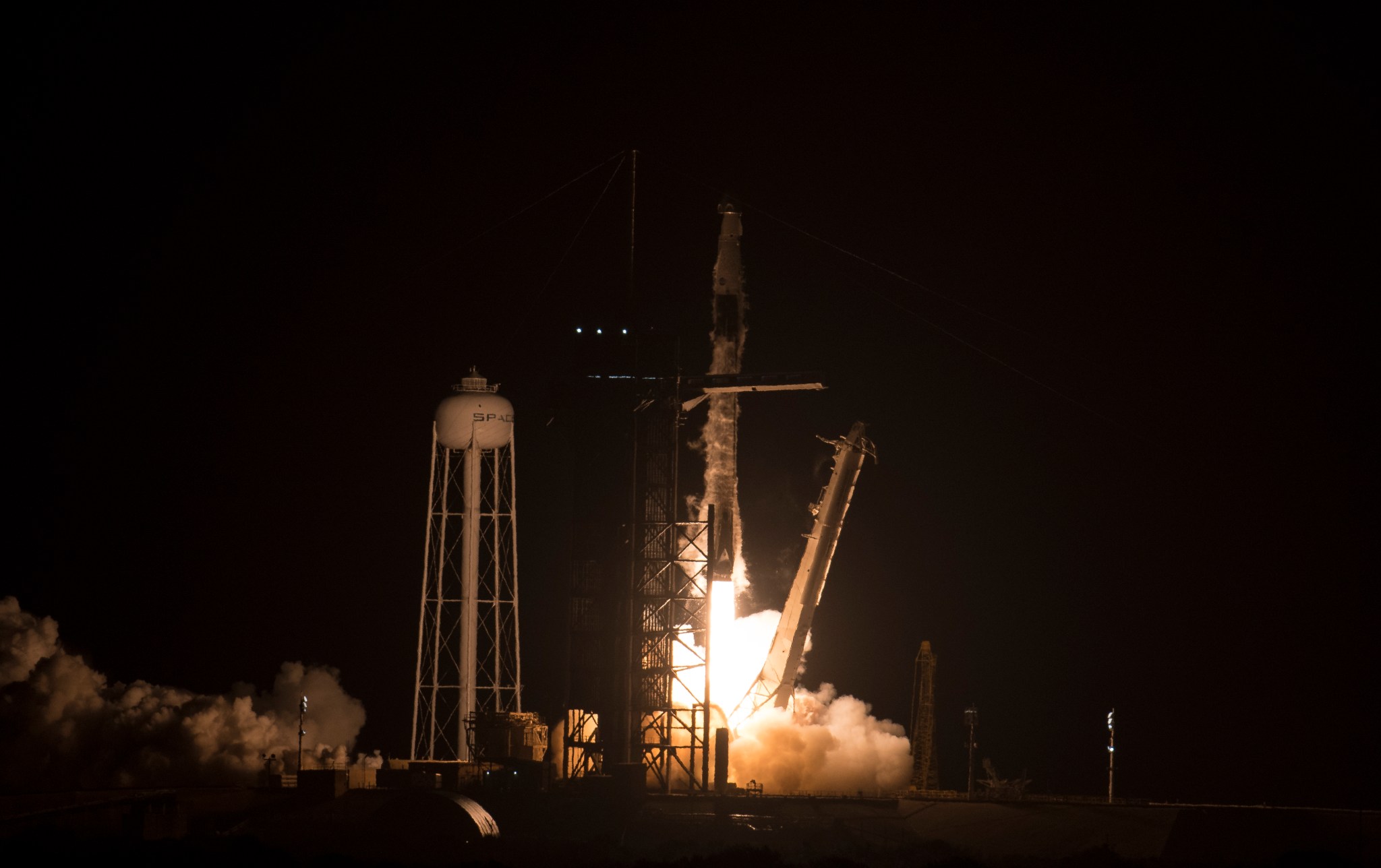 Rocket-Landing Site, Next Dragon Spacecraft Star in SpaceX Photos