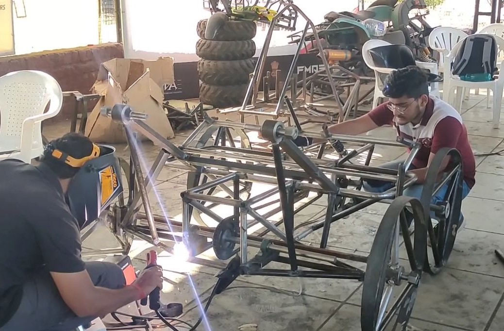 A team competing in NASA’s 2022 Human Exploration Rover Challenge works on building their rover. 