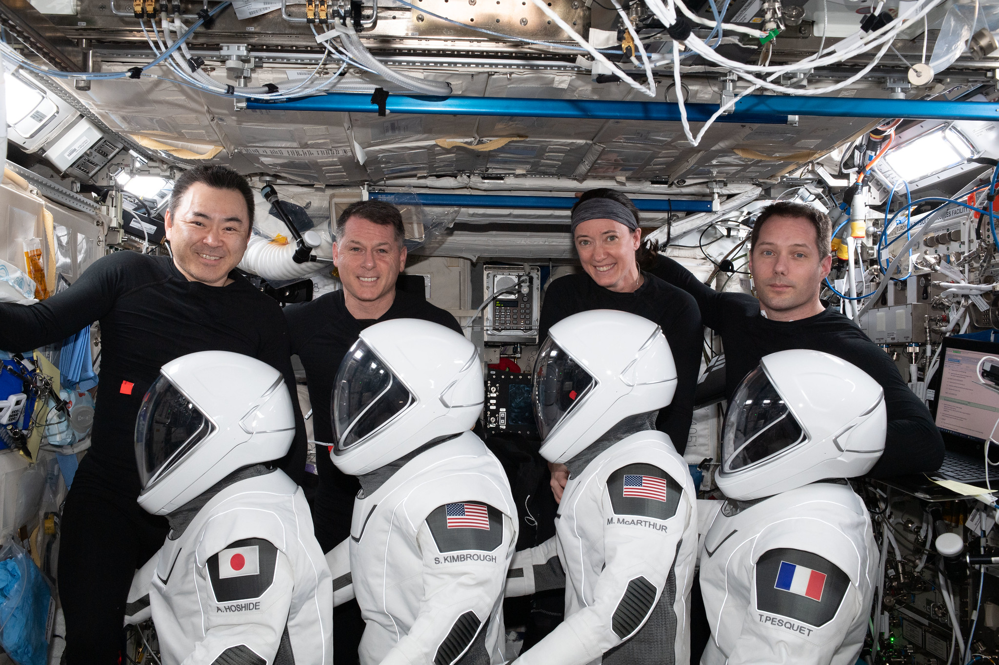 NASA’s SpaceX Crew-2 astronauts check out their Dragon Endeavour launch and entry suits several days before departing the International Space Station and returning to Earth.