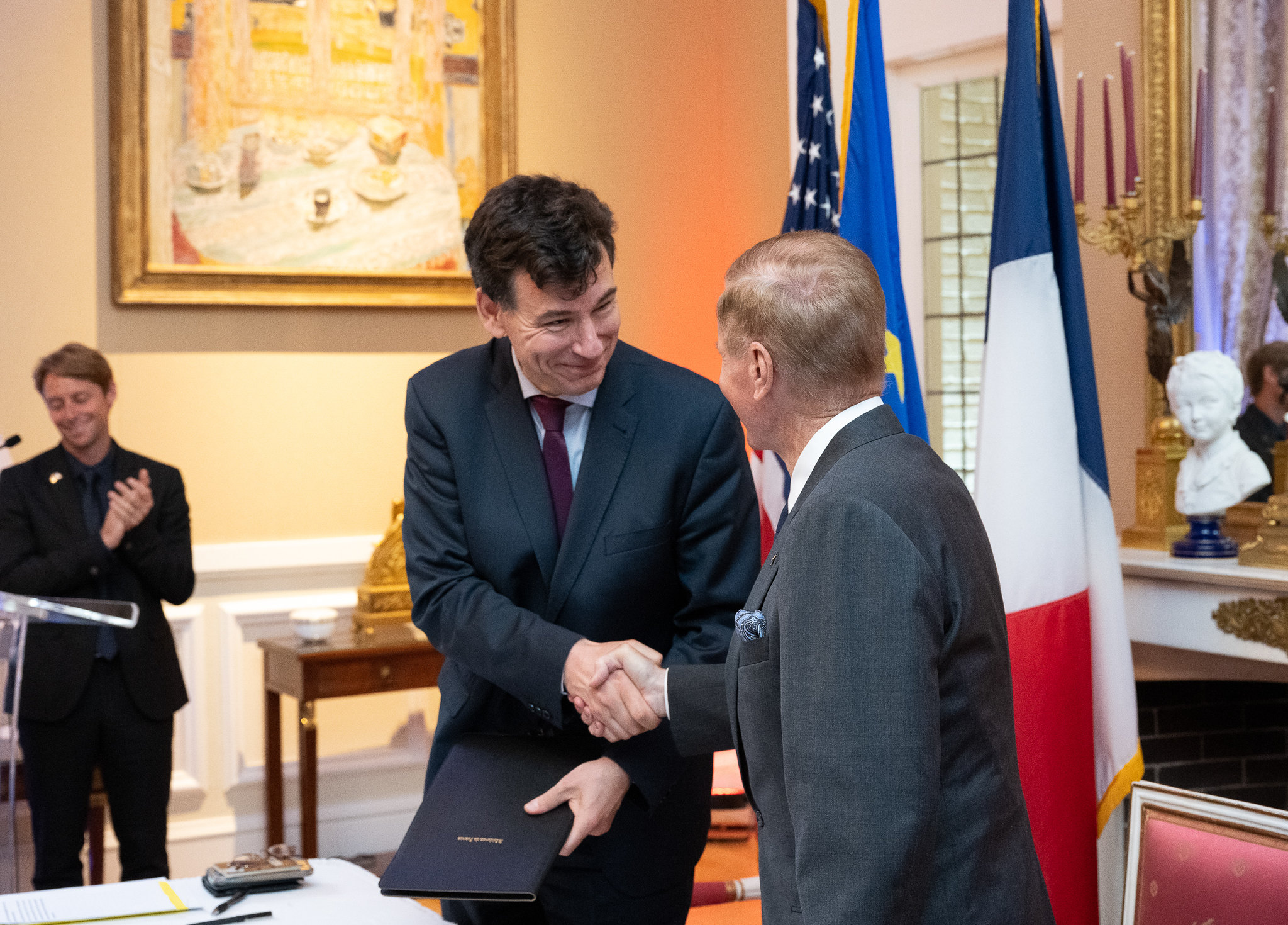 NASA Administrator Bill Nelson, right, and President of the Centre National d’Etudes Spatiales (CNES) Dr. Philippe Baptiste shake hands following the signing the Artemis Accords Tuesday, June 7, 2022, at the French Ambassador’s Residence in Washington.