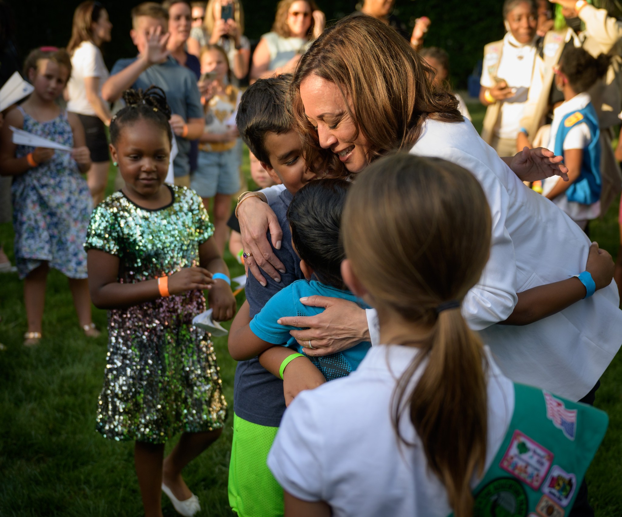 Vice President Kamala Harris hugs children that participated in hands-on STEM activities on the grounds of the Vice President's residence at the Naval Observatory, Friday, June 17, 2022, in Washington. 