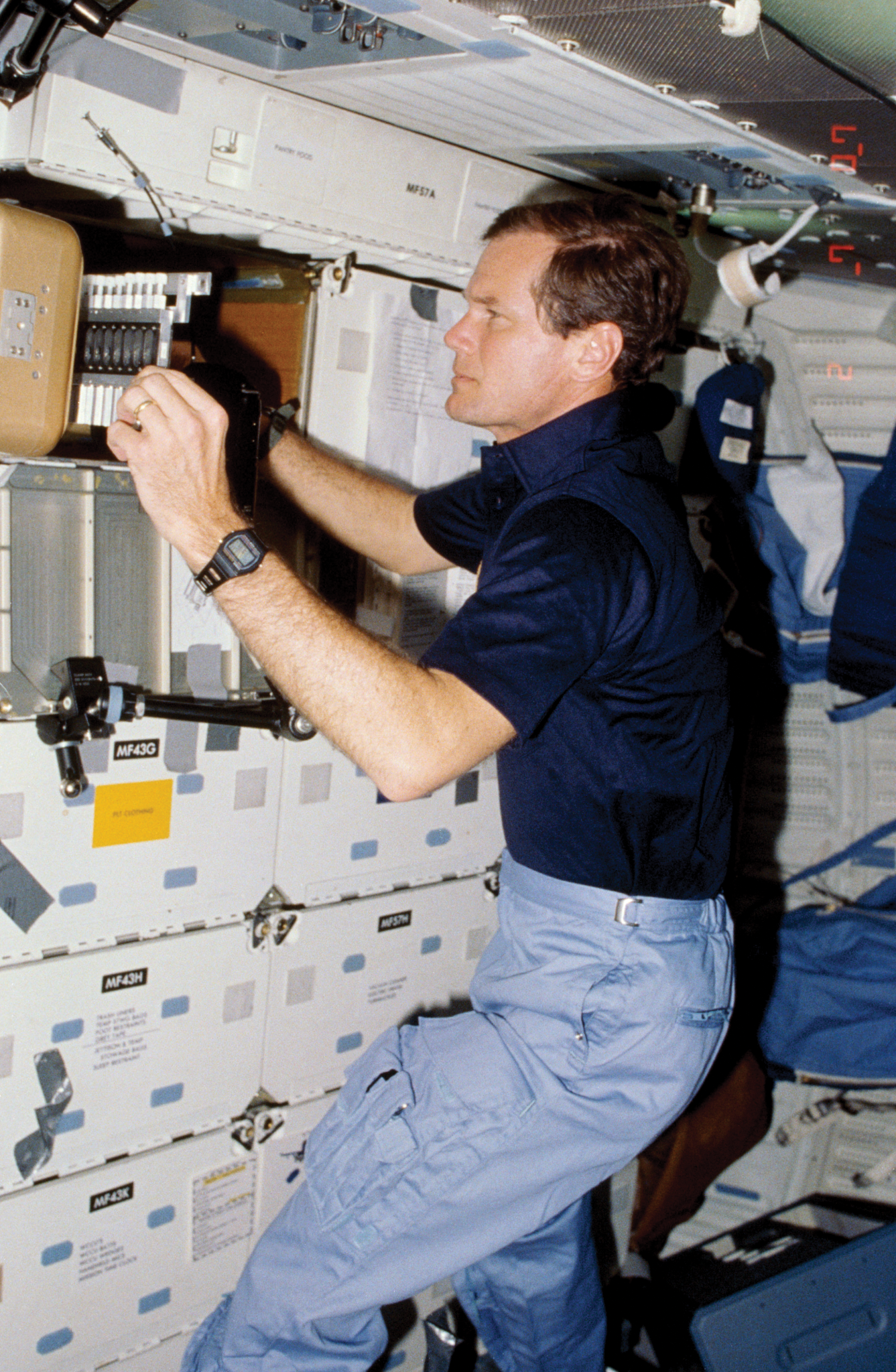 image of an astronaut working with an experiment