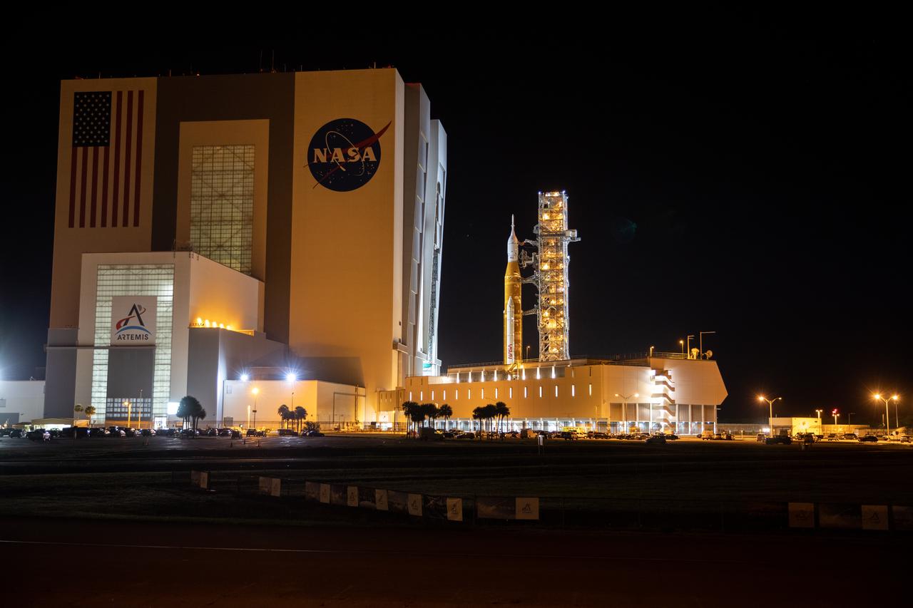 NASA’s Artemis I Moon rocket – carried atop the crawler-transporter 2 – rolls out of the Vehicle Assembly Building at the agency’s Kennedy Space Center in Florida on June 6, 2022, beginning the 4.2-mile journey to Launch Complex 39B. 