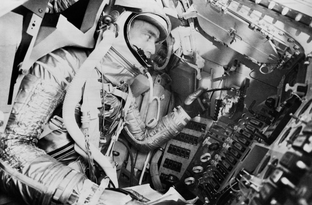 Astronaut Scott Carpenter undergoes a simulated mission in the procedures trainer at Langley Research Center.