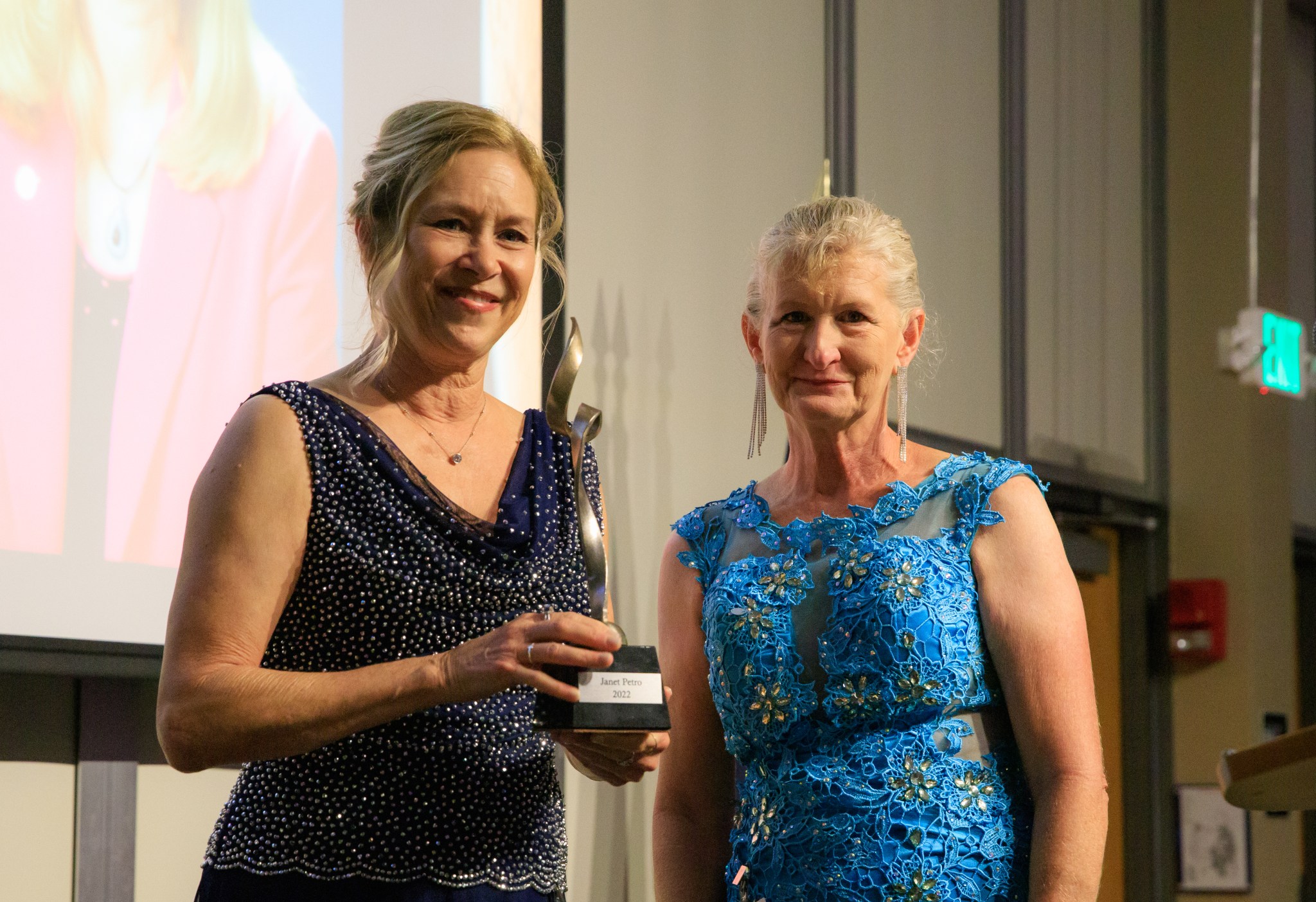 Tara Miller, National Space Club Florida chapter chair, presents Kennedy Space Center Director Janet Petro with the Dr. Kurt H. Debus Award on June 24, 2022.