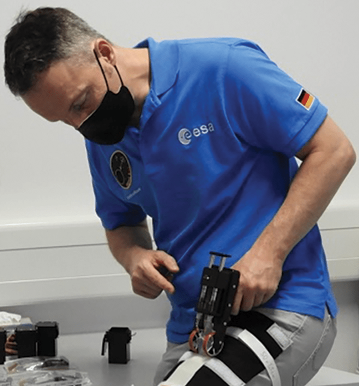 image of an astronaut training on human research experiment device