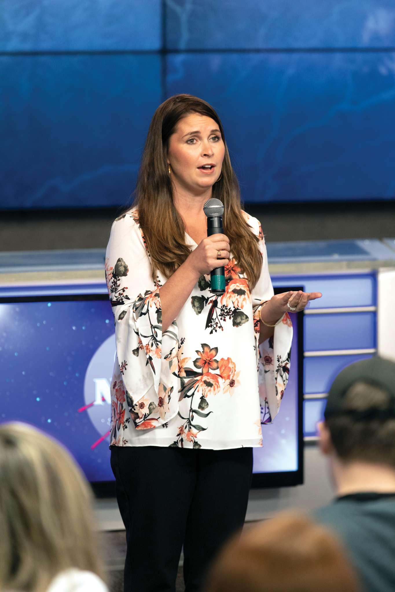 image of Lambda's CEO speaking to media at a preflight event