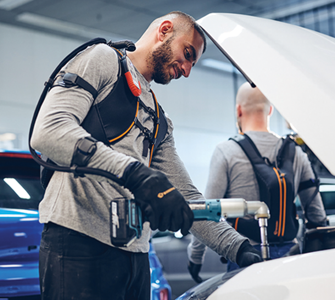 image of an engineer testing a robotic glove