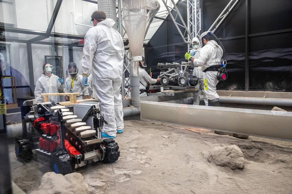 The Milwaukee School of Engineering’s robotic miner is ready for its turn to dig in the mining arena during NASA’s LUNABOTICS competition on May 24, 2022, at the Center for Space Education near the Kennedy Space Center Visitor Complex in Florida.