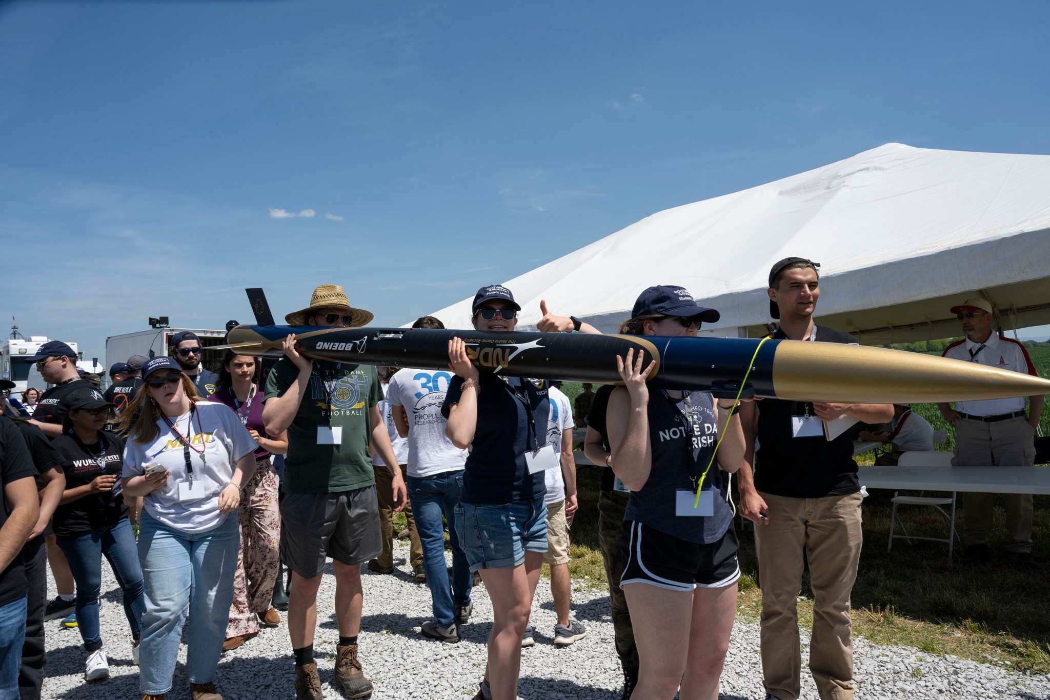 The University of Notre Dame team carries their rocket to the launch pad during the 2022 NASA Student Launch competition April 23.