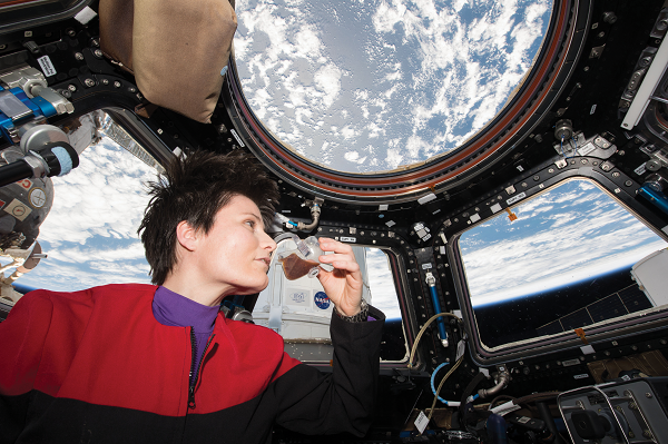 image of an astronaut drinking coffee 