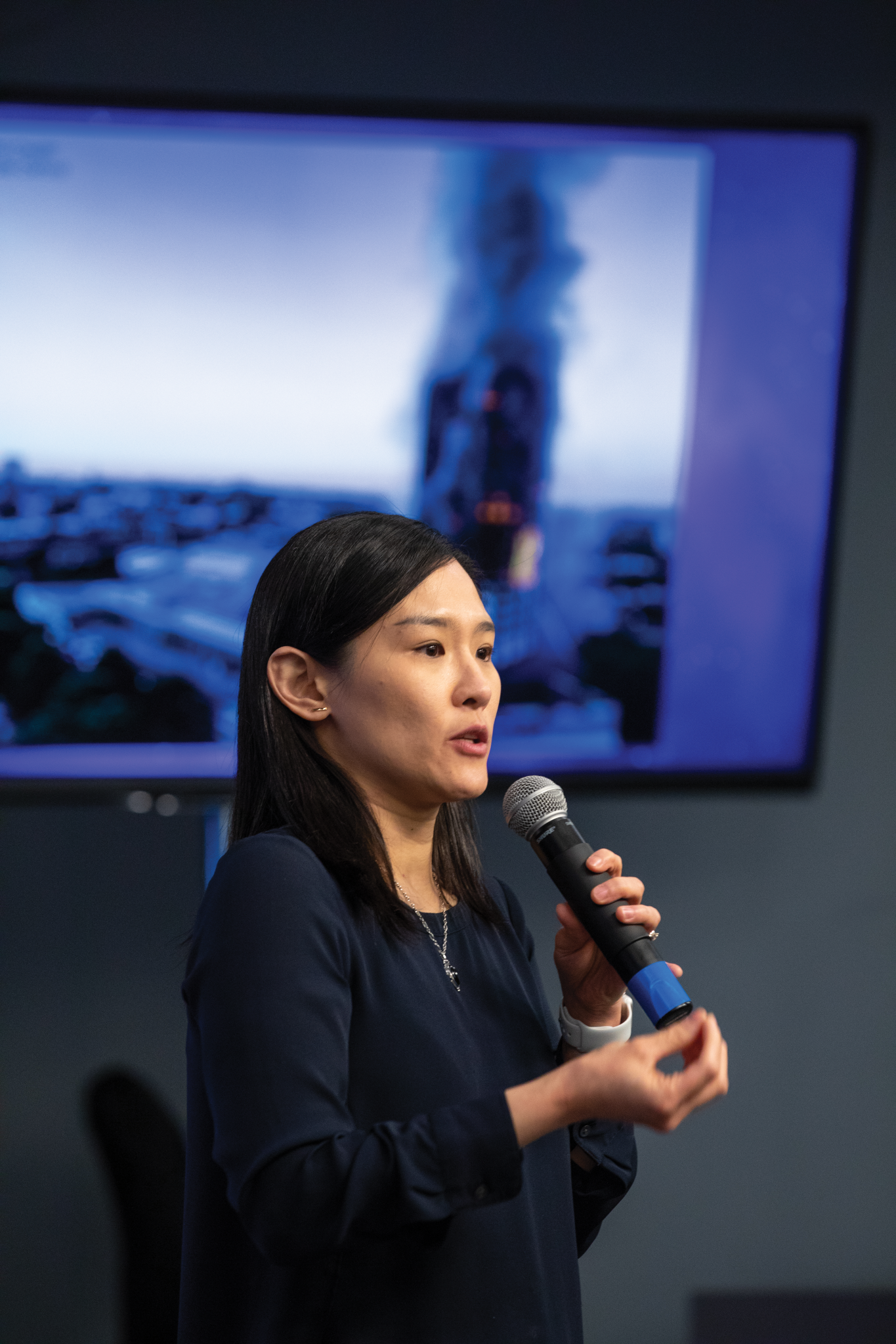 image of a science investigator speaking at an event