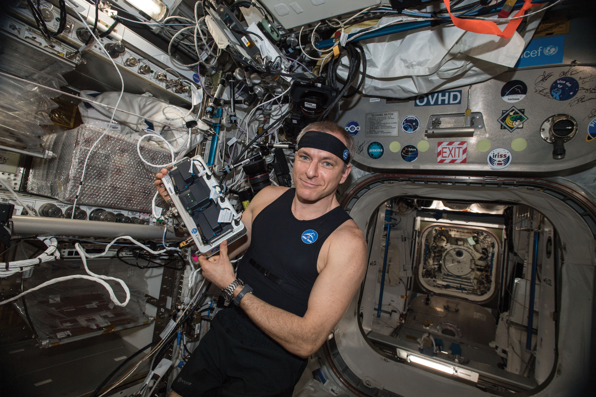 image of an astronaut holding the monitor