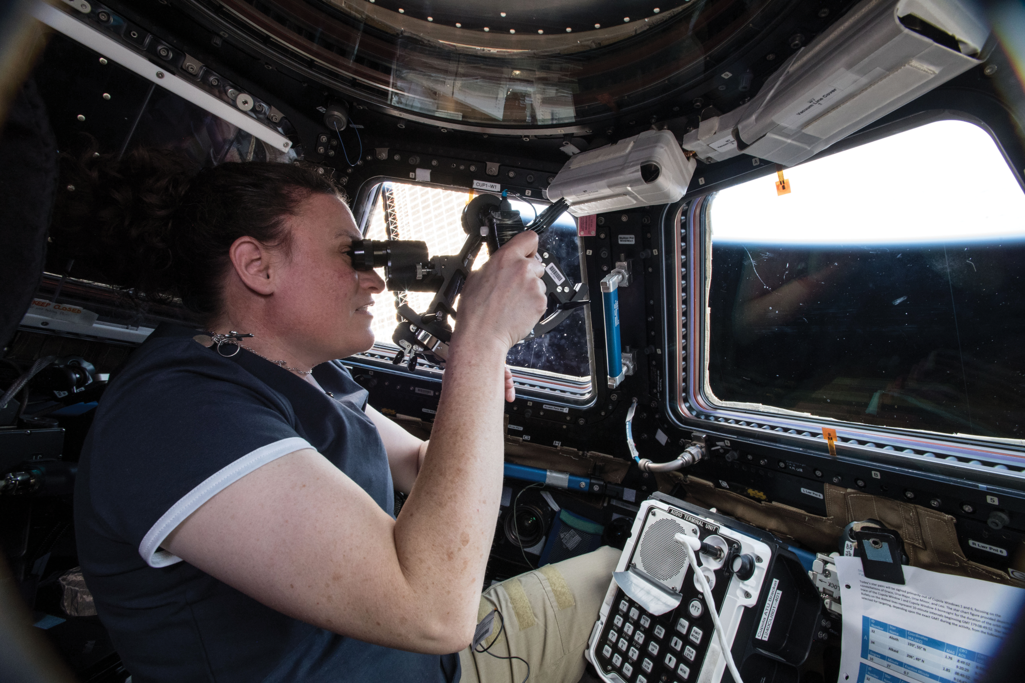 image of an astronaut taking navigational measurements
