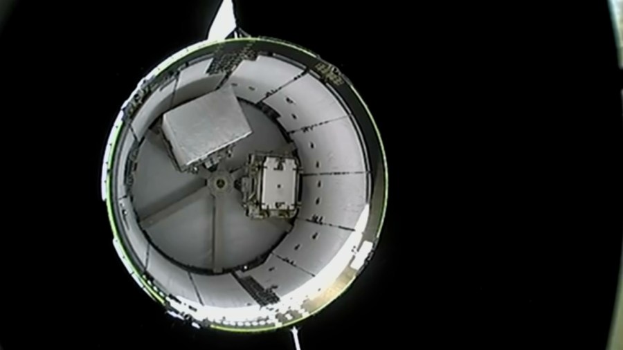 The underside of the SpaceX Dragon spacecraft can be seen as it separates from the company's Falcon 9 rocket on its journey to the International Space Station.
