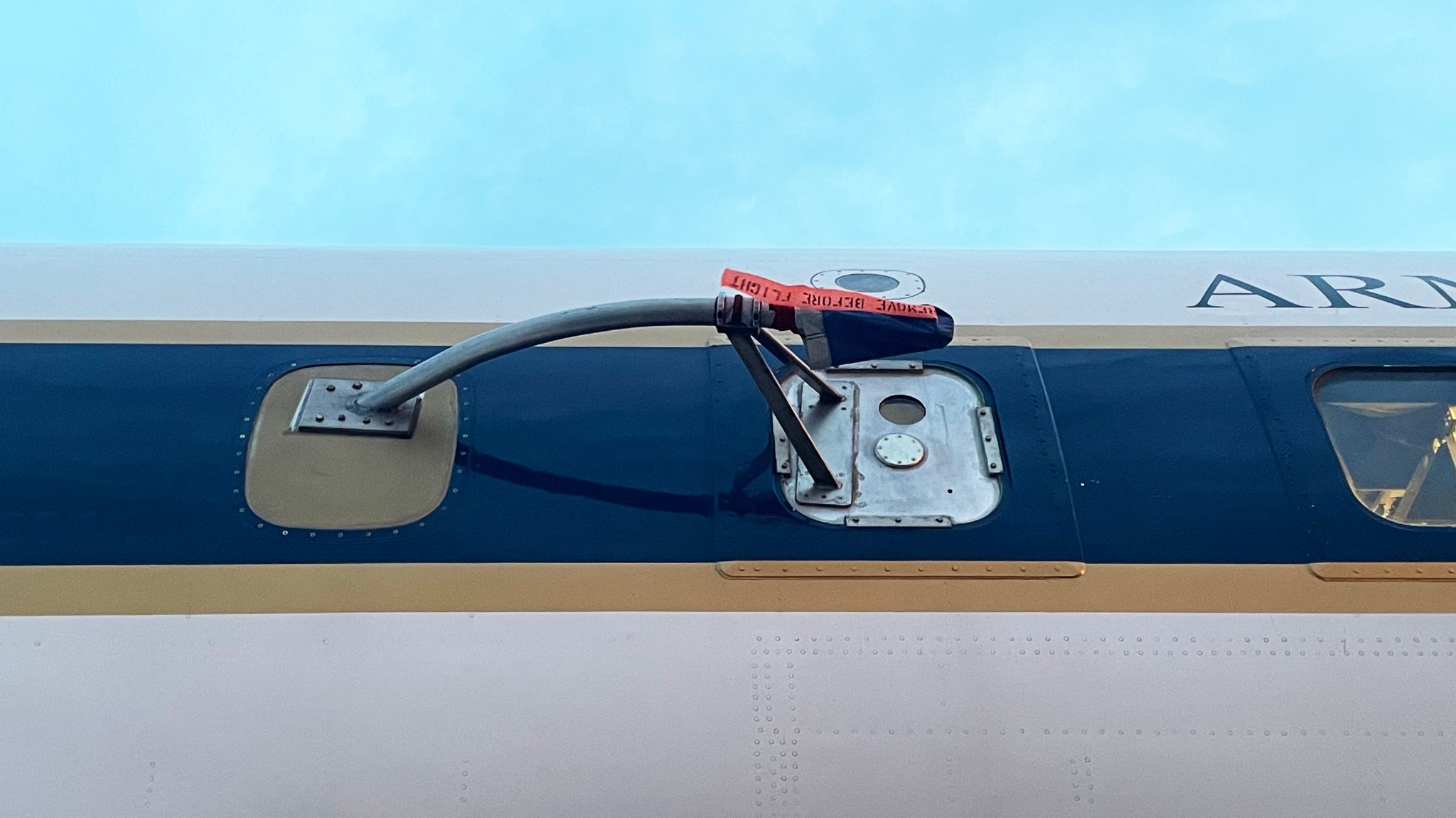 An air-inlet tube sticks out of a modified window aboard NASA’s DC-8 airborne science laboratory.