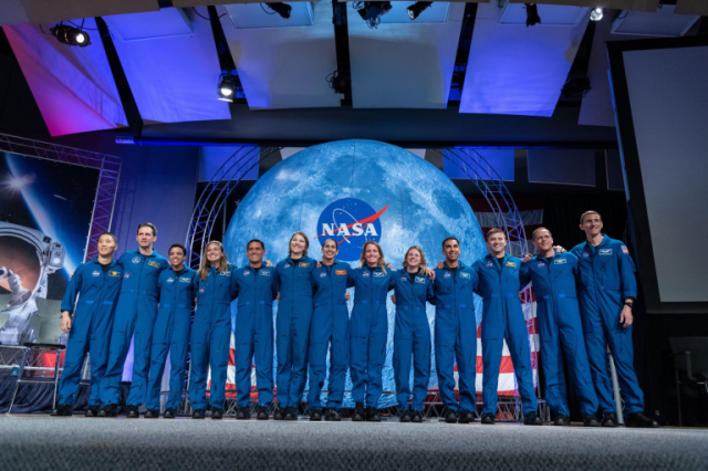 Newest class of astronaut standing in line for photo