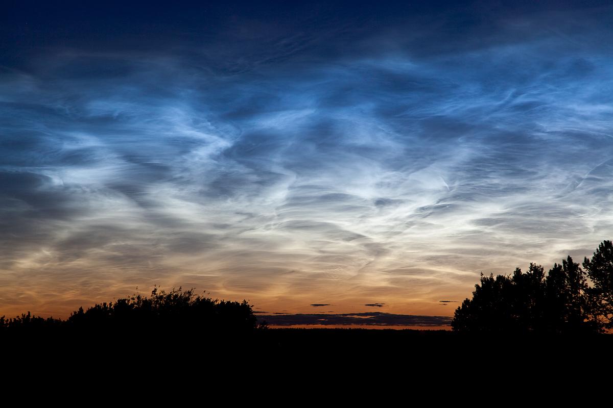 photo of noctilucent clouds over Canada, 2011