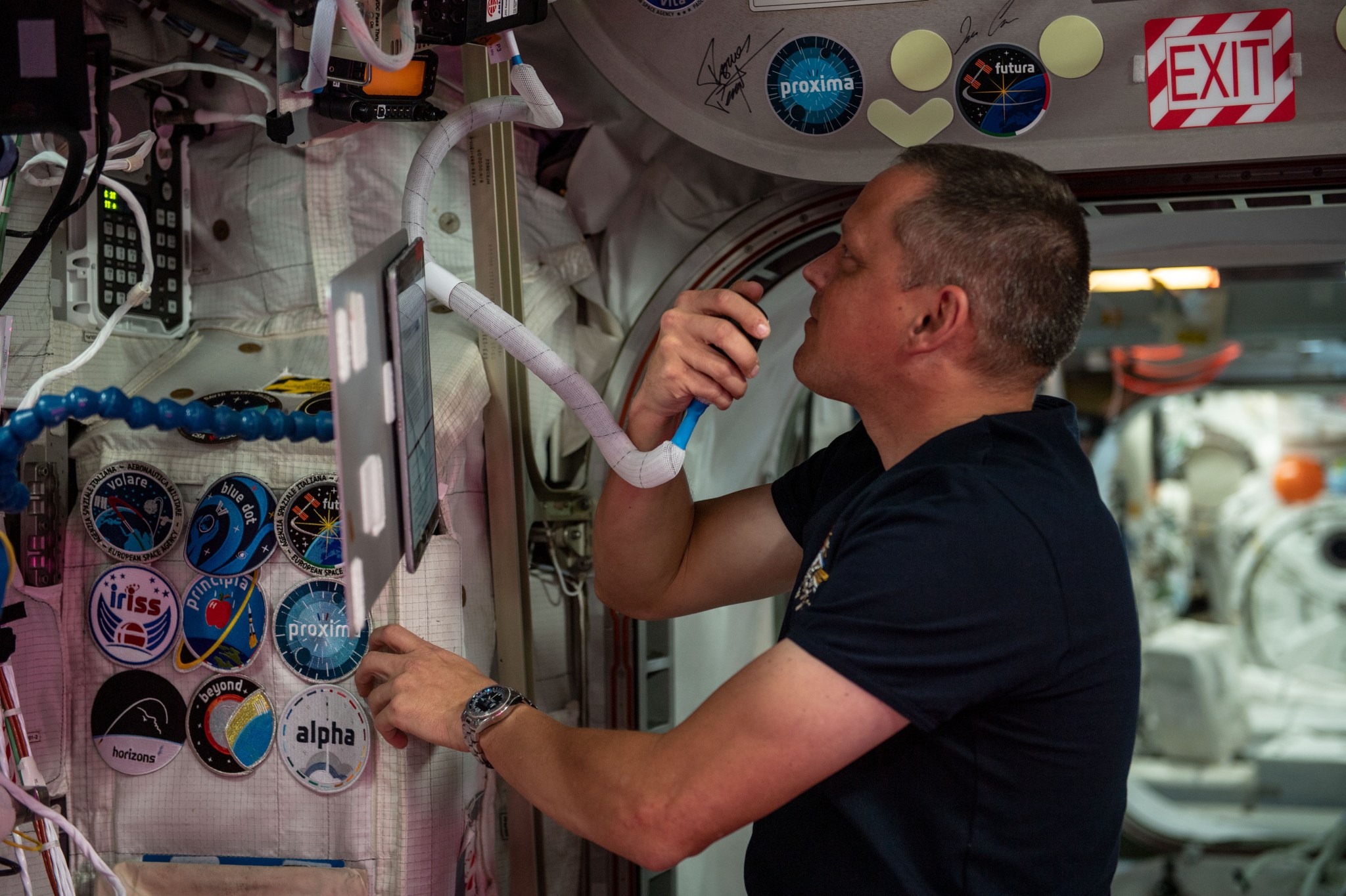 image of an astronaut communicating with a ham radio