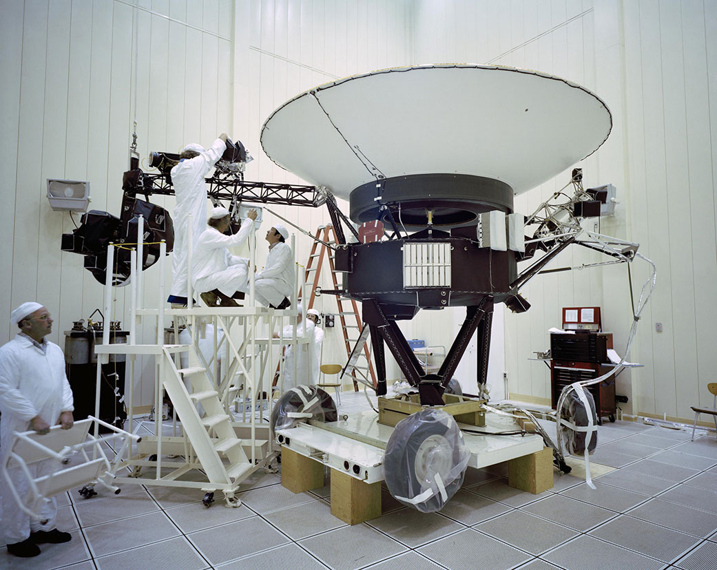 Engineers preparing the Voyager 2 spacecraft 