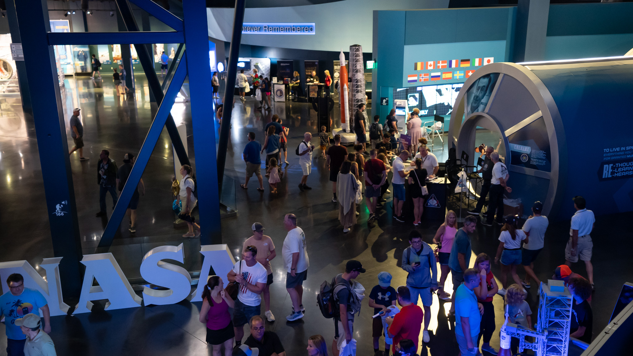 Guests visit the Space Launch System exhibit at the Kennedy Space Center Visitor Complex in Cape Canaveral, Florida. 