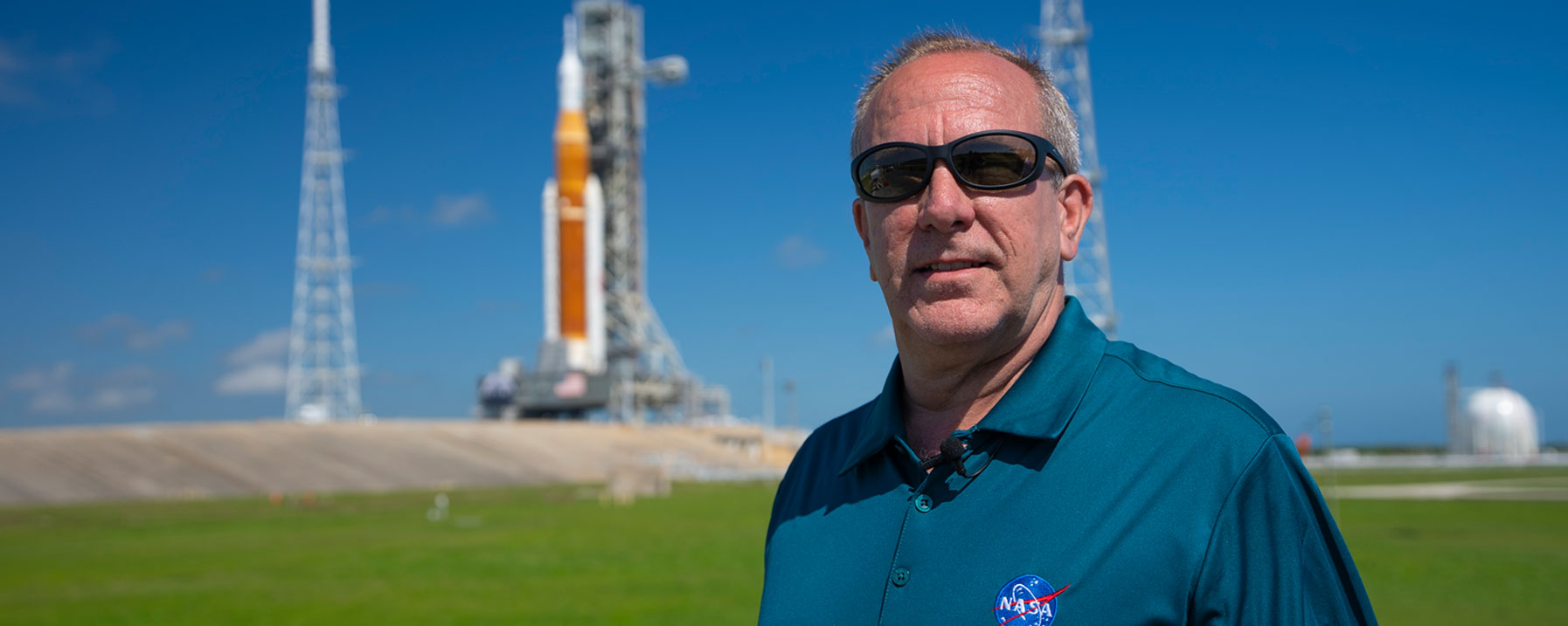 David Beaman, manager of the Space Launch System (SLS) Engineering & Integration Office at NASA’s Marshall Space Flight Center in Huntsville, Alabama, views the SLS rocket on the launch pad.