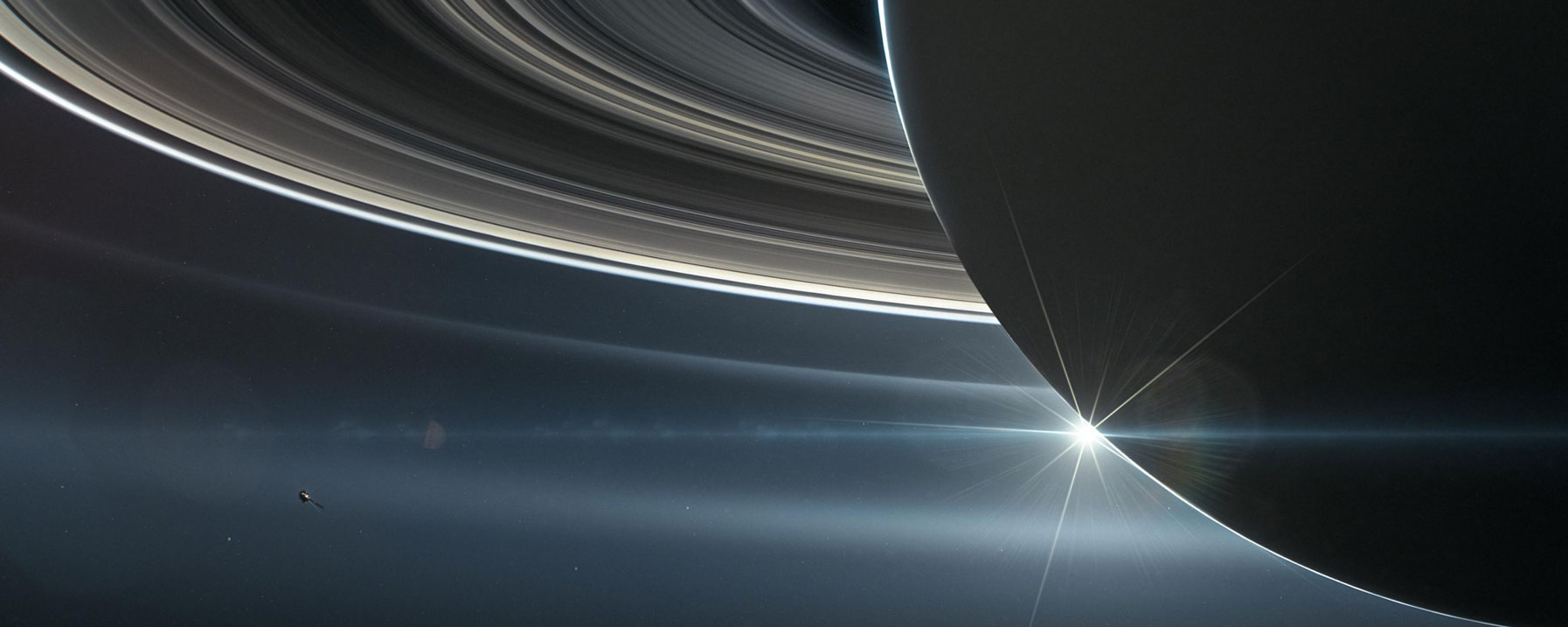 An illustration of NASA’s Cassini spacecraft in orbit around Saturn, where it documented the ringed planet in 2017.