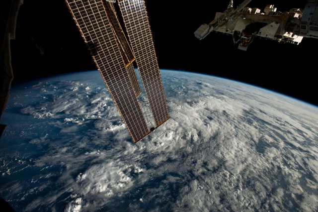 International Space Station soars above a cloudy Atlantic Ocean