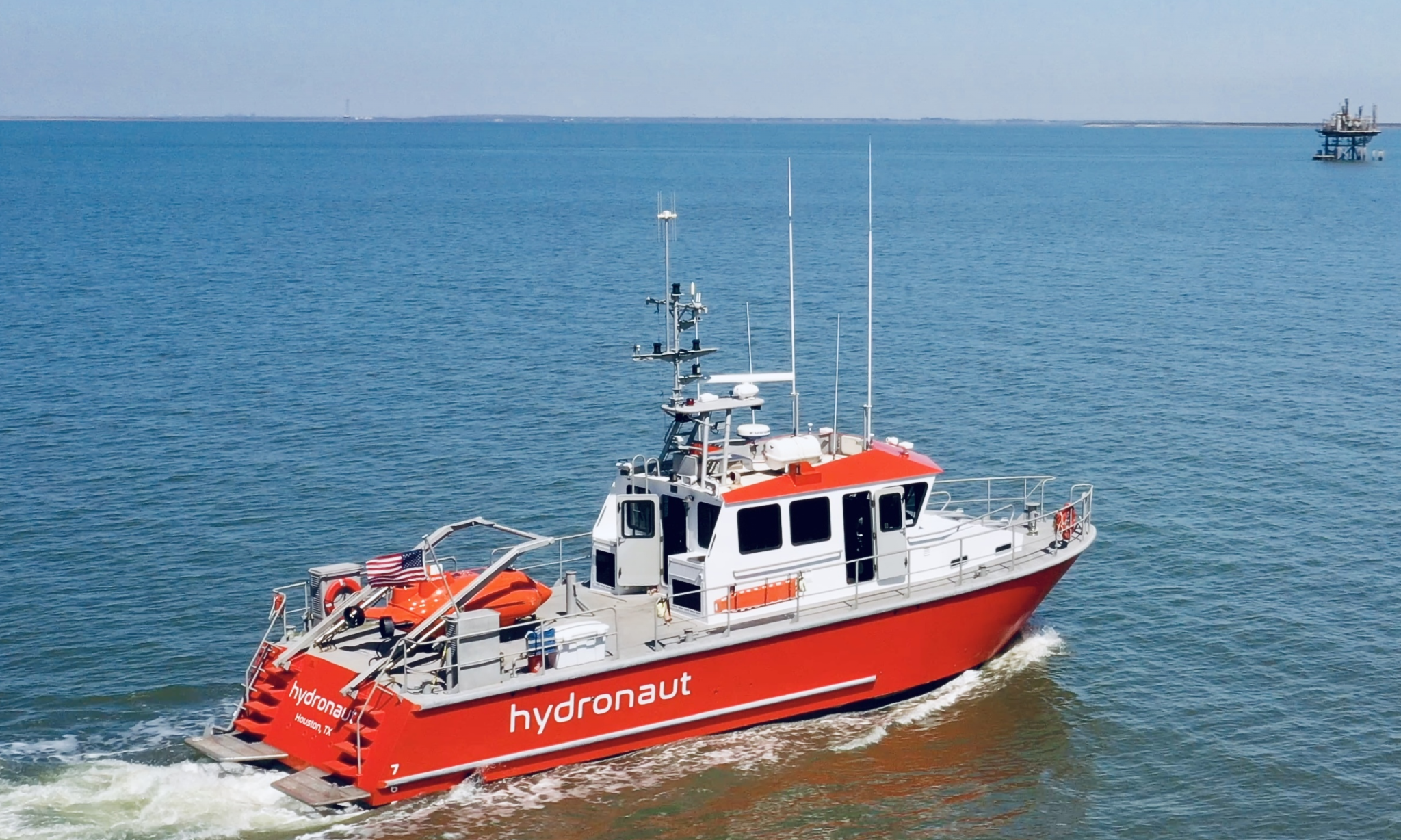 Boat in the ocean carrying Aquanaut.