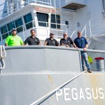 NASA Pegasus barge crew members aboard Pegasus at Stennis Space Center on Aug. 9.