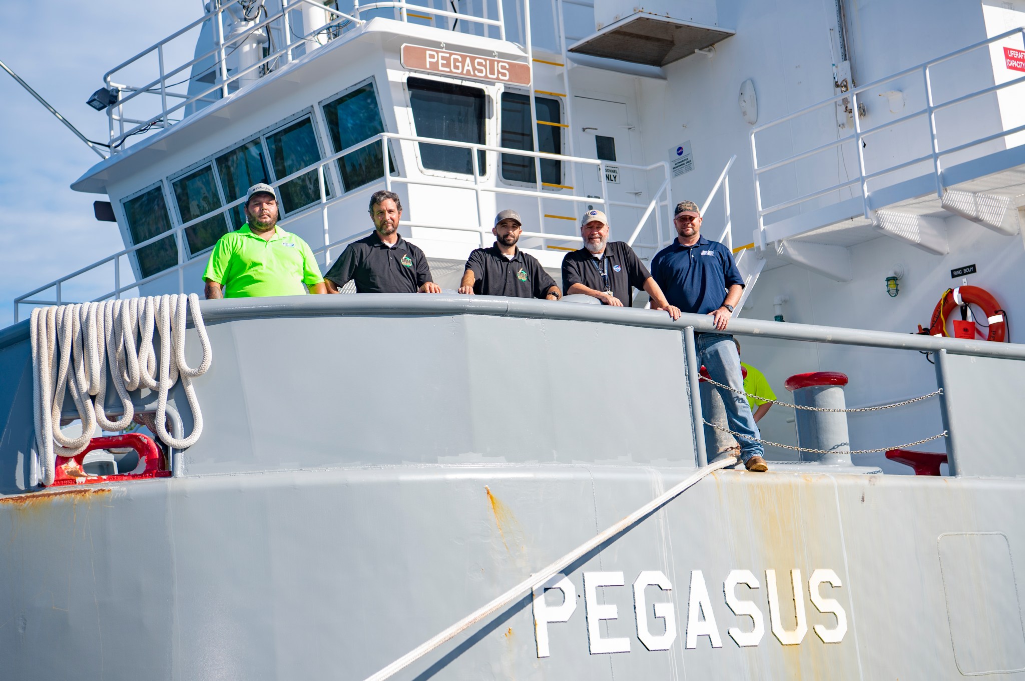 NASA Pegasus barge crew members aboard Pegasus at Stennis Space Center on Aug. 9. 