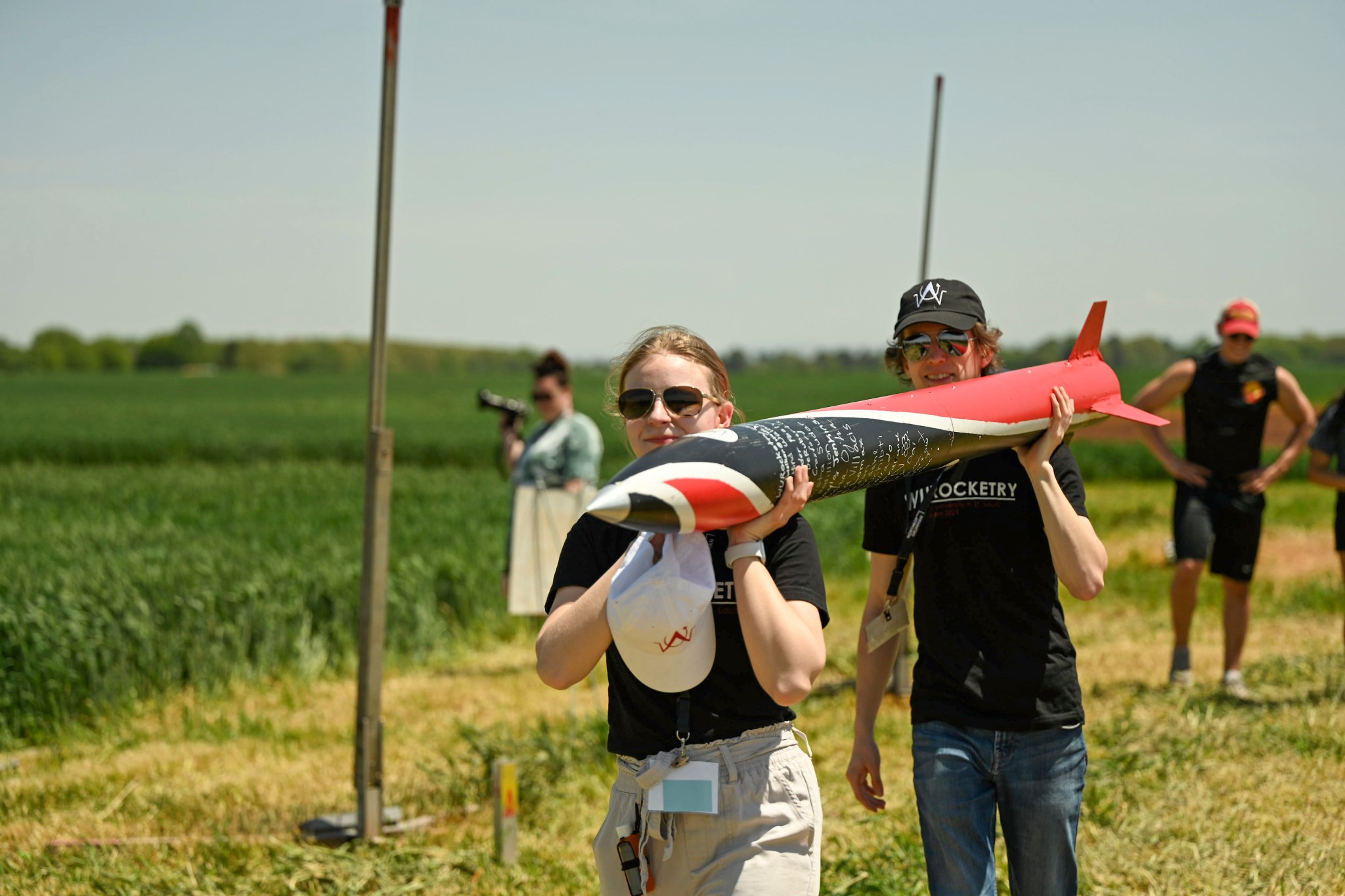 Students from Washington University in St. Louis, Missouri, carry their rocket to the launch pad during the 2022 NASA Student Launch Challenge.