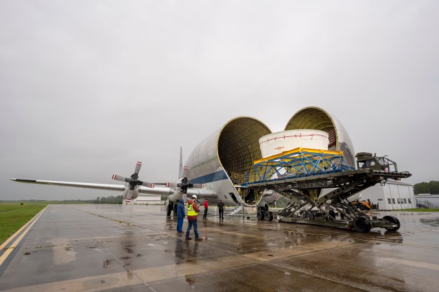 The Orion Stage Adapter structural test article is unloaded from NASA’s Super Guppy cargo aircraft at Redstone Arsenal Airfield in Huntsville, Alabama, Aug. 10.