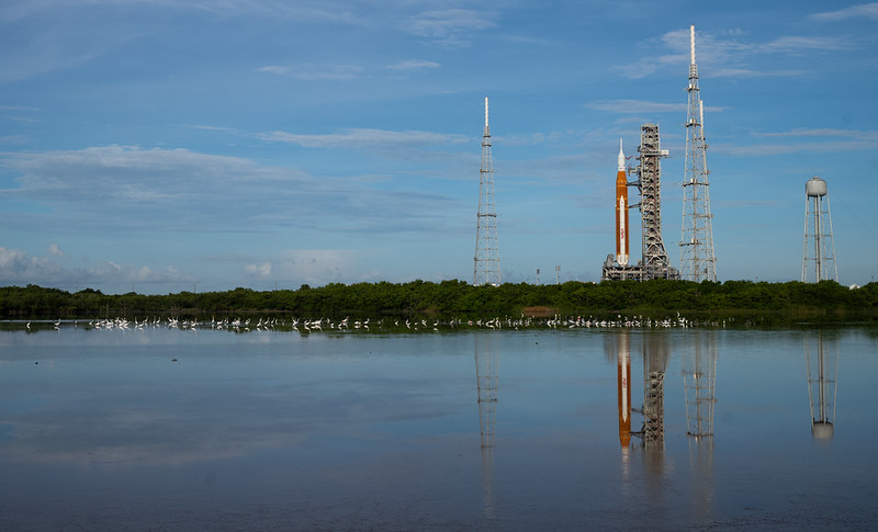 NASA’s Space Launch System (SLS) rocket with the Orion spacecraft aboard is seen atop a mobile launcher.
