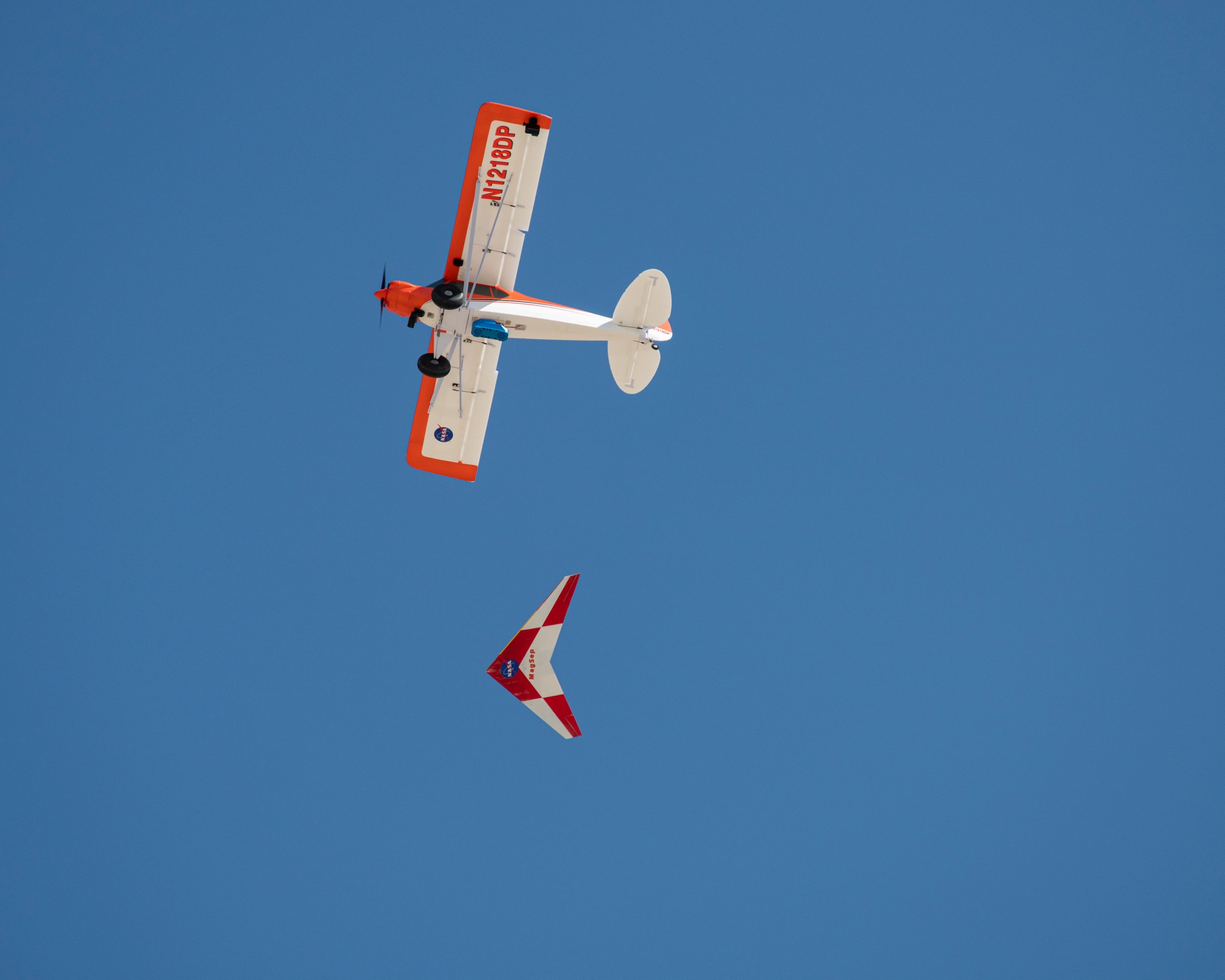 The Preliminary Research Aerodynamic Design to Land on Mars, or Prandtl-M, glider flies after a magnetic release mechanism on the Carbon-Z Cub was activated to air launch the aircraft.