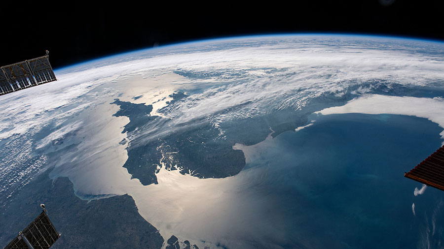 The sun's glint beams across the English Channel and the North Sea in between England and the northern European coast as the station as it orbited 263 miles above. Credit: Thomas Pesquet/ESA