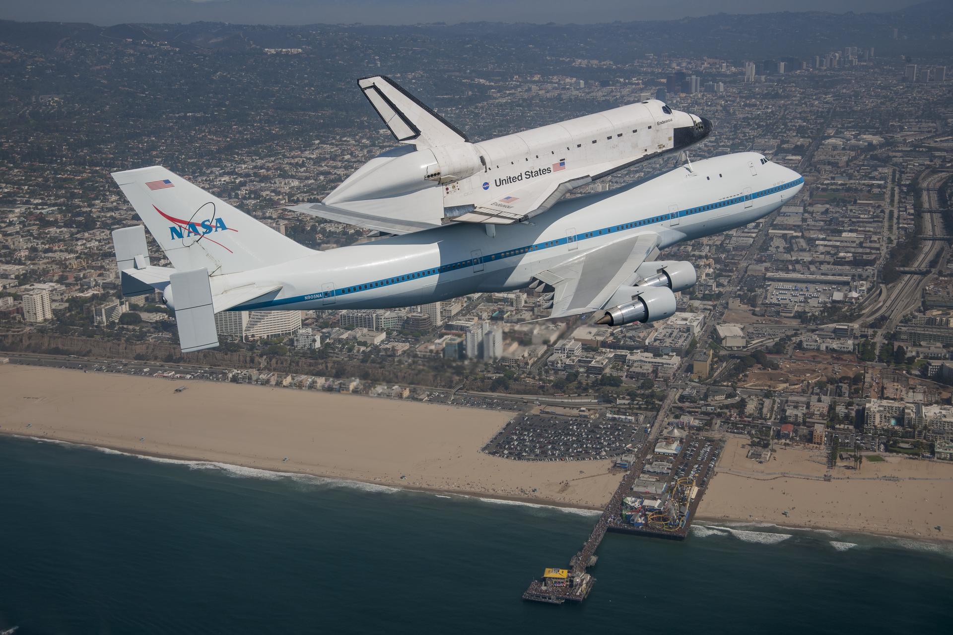 Space shuttle Endeavour and its host NASA 747 Shuttle Carrier Aircraft