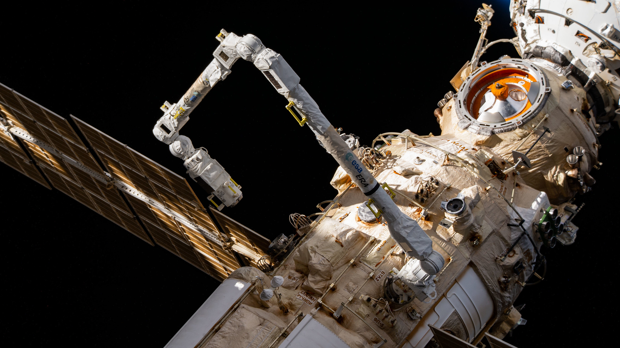 The European robotic arm (ERA) is pictured extending out from the Nauka multipurpose laboratory module during a mobility test.