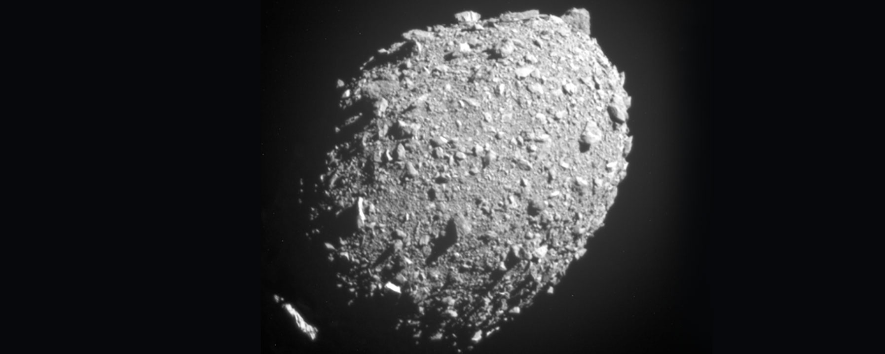The last complete image of asteroid moonlet Dimorphos, taken by the DRACO imager on NASA’s DART mission from ~7 miles from the asteroid and 2 seconds before impact. The image shows a patch of the asteroid that is 100 feet across.